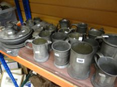 Parcel of assorted pewter to include various sized tankards, jugs together with twin-handled tray,