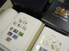 A neat Stanley Gibbons cased series of Queen Elizabeth II stamp albums with commemorative and