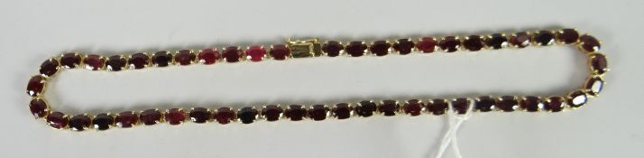 A ruby line necklace with full jewellers assessment paperwork (please see image) Condition reports