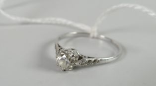 A round cut diamond solitaire ring in an eight-claw setting on white gold / platinum, visual