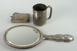 Silver cherub design vanity mirror together with purse and silver tankard (3) Condition reports