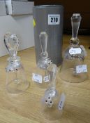 Three Swarovski table dinner ornamental bells and a boxed Swarovski silver crystal ornament