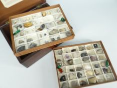An antique mahogany hinged box containing approx. sixty conchology samples of minerals and shells,