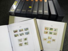 Eight neat Stanley Gibbons cased numbered and titled folders for Channel Island stamps with well