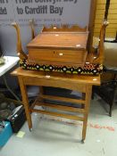 A vintage sloped and galleried writing box, a long stool covered in a section of traditional Welsh