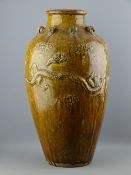 A LARGE MARTABAN BALUSTER SHAPED NARROW NECKED JAR, 60 cms high having raised dragons and eight