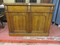 AN EARLY VICTORIAN MAHOGANY CHIFFONIER BASE having two drawers and two cupboards with inset