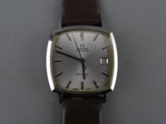 A GENT'S OMEGA AUTOMATIC CALENDAR WRISTWATCH, circa 1977 with brown leather strap