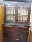 A CIRCA 1840 PAINTED PINE FARMHOUSE CUPBOARD CHEST having twin twenty pane upper cupboard doors