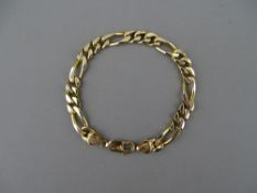 A NINE CARAT GOLD FIGARO STYLE LINK BRACELET, 21.4 grms