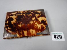 A TORTOISESHELL & SILVER CORNER MOUNTED CARD PURSE (one corner mount and centre star mount missing),