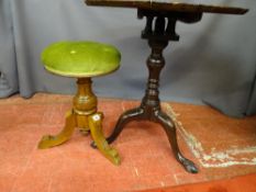 AN ANTIQUE MAHOGANY TILT TOP TRIPOD TABLE with birdcage sub frame and piecrust top, having carved