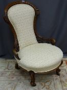 A VICTORIAN CARVED WALNUT SPOONBACK PARLOUR CHAIR having pierced leaf and scroll detail, modern