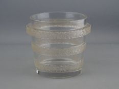 A LALIQUE RICQUEWIHR GLASS BUCKET VASE having three raised bands of flowers and berries, 12 cms