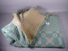 A TRADITIONAL WELSH WOOLLEN BLANKET in green, yellow and pink tones with original Holytex label (