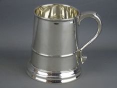 A PLAIN SLIGHTLY TAPERED SILVER MUG, 8 troy ozs, Sheffield 1944