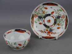 A FIRST PERIOD WORCESTER 'KEMPTHORNE' TEA BOWL & SAUCER, 7.5 and 12 cms diameter respectively, in