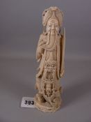 A 19th CENTURY CHINESE CARVED IVORY STANDING FIGURE OF A BEARDED MAN lifting his beard to expose a