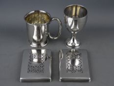 A PAIR OF OBLONG SILVER LIDS with scrolled decoration, probably for glass boxes, 3.2 troy ozs,