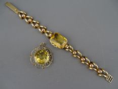 A FOURTEEN CARAT GOLD LINK BRACELET with large centre oblong citrine, 2 x 1.5 cms, 18.5 grms gross