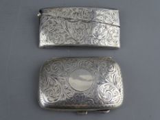 A BRIGHT CUT SILVER LADY'S CIGARETTE CASE, 1.3 troy ozs, Birmingham 1919 and a bright cut silver