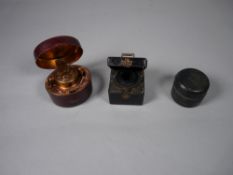 THREE TRAVELLING INKWELLS, a square Berry's Patent, a small circular un-named and an oval with