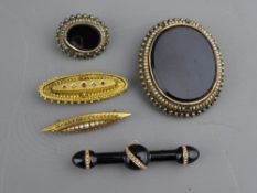 FIVE VICTORIAN GOLD & OTHER BROOCHES including a fifteen carat gold brooch set with small diamonds