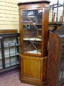 A REPRODUCTION MAHOGANY TWO PIECE CORNER CUPBOARD the upper section having a single astragal