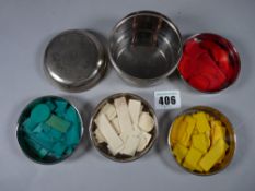 A VINTAGE WIRA PATENT NECESSAR containing four Petri dishes of stained bone games counters