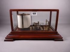 A VINTAGE BRASS MAHOGANY CASED BAROGRAPH with applied optologist's label for Wood Abrahams,