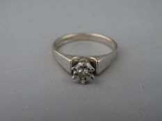 AN EIGHTEEN CARAT WHITE GOLD DIAMOND SOLITAIRE DRESS RING, visual estimate of diamond 0.3 carat, 4