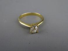 AN EIGHTEEN CARAT GOLD DIAMOND SOLITAIRE RING, visual estimate 0.65 carat, 3 grms gross, size N/