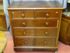 A VICTORIAN MAHOGANY CHEST OF TWO SHORT OVER THREE LONG DRAWERS having cockbeaded edging and