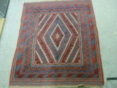 A CAZAK RUG, blue and red ground variants, central diamond block pattern and multi-bordered