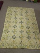 A KASHMIRI WOOLLEN CHAIN HAND STITCHED RUG, with all over muted flowers, 170 x 118 cms