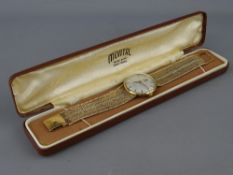 A NINE CARAT GOLD GENT'S TISSOT STYLIST WRISTWATCH with integral strap, stamped 9.375, 54 grms