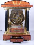 AN ART DECO STYLE KIENINGER, GERMANY CHIMING TABLE CLOCK with key, burr walnut, ebony and brass