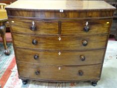A VICTORIAN MAHOGANY BOW FRONT CHEST OF TWO SHORT OVER THREE LONG DRAWERS with diamond shaped