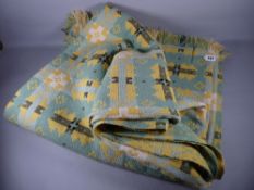 A TRADITIONAL WELSH WOOLLEN BLANKET in green, yellow and black reverse patterning, 220 x 240 cms