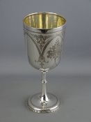 A CIRCULAR BASED BRIGHT CUT SILVER TROPHY CUP, 22.5 cms high, 9.3 troy ozs, London 1895