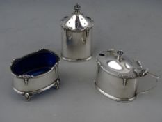 A SET OF THREE SILVER CONDIMENTS, each piece of oval form with classical style garlands, the mustard