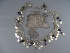 A STERLING SILVER CHAINMAIL EVENING BAG, a similar white metal purse and a vintage style white metal