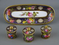 A CIRCA 1810 SPODE PORCELAIN HANDPAINTED DESK SET comprising a 19.5 cms pen tray on gilt hoof feet