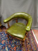 AN EDWARDIAN MAHOGANY & GREEN LEATHER OFFICE CHAIR, the curved back on turned gallery with shaped