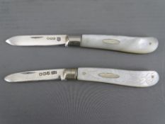 TWO MOTHER OF PEARL SILVER BLADED FRUIT KNIVES