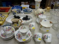 Floral decorated teaware, blue and white china, pair of milk glass recumbent lions etc