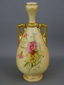 Royal Worcester narrow necked two handled blush ground vase with floral posy decoration front and