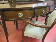 Late 19th/early 20th Century bow front mahogany side table, a polished and upholstered elbow chair