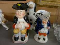 Two vintage pottery Toby jugs and a Staffs comforter dog