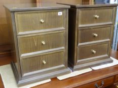 Pair of three drawer bedside chests